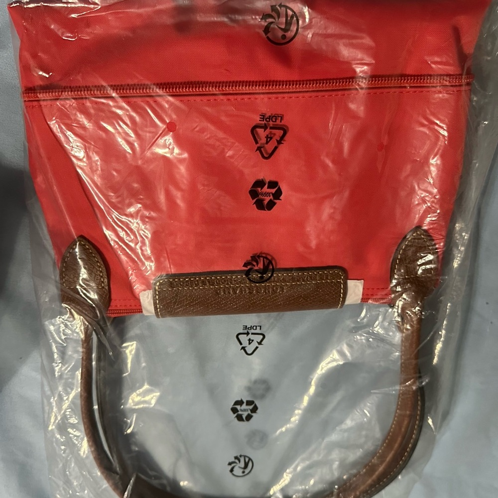 Brand new coral le pilage bag- expandable